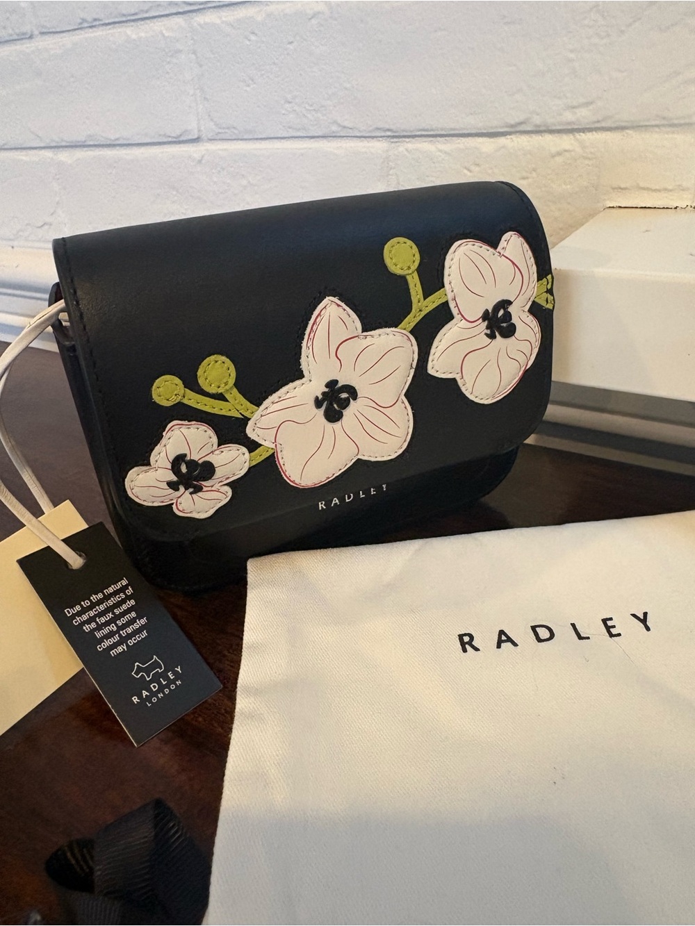 NWT RADLEY LONDON Black Crossbody Bag with white/ Pink Floral Appliques - Picture 2 of 9
